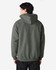 A grey Gildan Softstyle adult hooded sweatshirt displayed on a person from the back, featuring a hood and relaxed fit.