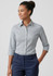 A women's button-up shirt with a checked pattern, featuring 3/4 sleeves and a collar, in shades of grey and white.