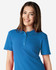 A woman smiles while wearing a blue Gildan Softstyle Ladies' Double Pique Polo with a collar and buttons.