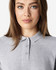 A grey polo shirt with a collar and button detailing, featuring a logo on the chest area.