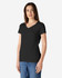 A black Gildan Softstyle ladies' V-neck T-shirt displayed on a model, paired with blue jeans.