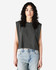 A women's muscle t-shirt in dark grey, featuring a cropped, sleeveless design. The model has curly hair and wears jeans.