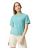 A lightweight, turquoise boxy T-shirt for women, featuring a round neckline and short sleeves. It has a logo.