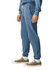 Lightweight track pants in a soft blue colour with a drawstring waist and side pockets. Features branding.