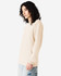 A long sleeve t-shirt in a light beige colour, featuring a logo on the front and a relaxed fit.