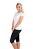 A woman poses in a fitted white slim fit tee paired with black leggings, showcasing a clean and casual look.