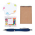 A blue pen, a notepad, colorful sticky notes, and a pouch of jelly beans on a white background.