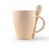 A reusable cup in light beige with a matching spoon, featuring a handle and a textured finish.