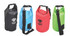Aqua Dry Bags in black, red, blue, and green, featuring adjustable straps and branding on the front.