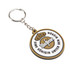 A round, rubber keyring with a gold crown design, featuring a logo and attached to a metal keychain.
