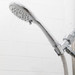 HealthGuard handheld chrome showerhead on showerwall HealthGuard handheld chrome showerhead on showerwall