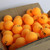 Some orange balls in box