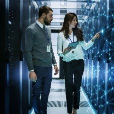 people walking through a data center