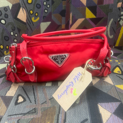 Candy Red!

Sweet Prada Mini Nylon Handbag!