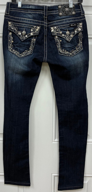 Classic bootcut silhouette meets signature Miss Me bling detailing on the back pockets.  Pairs perfectly with heels for a night out or sneakers for a casual everyday look!