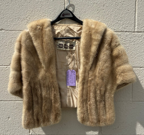 A stunning 1950s-vibe mink wrap from the iconic Carson Pirie Scott, radiating old Hollywood elegance. A rare vintage collector's piece, perfect for layering over an evening gown or adding instant glamour to any formal look!