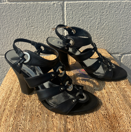 Multiple straps wrap up in classic gladiator style, finished with eye-catching studs and a sturdy stacked heel for extra height and edge. A versatile statement shoe that pairs perfectly with denim, dresses, or shorts for an effortlessly cool look.