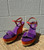With a striking purple and orange suede color-block design and a chunky wedge heel, these shoes are THE Y2K statement piece.
Perfect for summer fits or to add color to a night out!