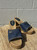 A true throwback piece, these slides feature a denim upper and solid wooden sole for a classic vintage look.