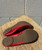 A timeless, chic red leather flat with the iconic Tory Burch logo. Comfortable, versatile, and polished enough for the office or dressed down with jeans - a true closet staple!