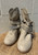 Studded hardware and rhinestones cover these beautiful tan boots, finished with a moto-inspired harness strap for extra edge. A true statement piece for anyone who likes their footwear bold and unforgettable!