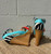 A bold zebra print with a vibrant light blue and red coloring gives these wedges major statement-piece energy. Sleek and high, they are perfect for elevating any outfit from casual to night-out!