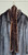 A luxurious mahogany fur coat complete with belt and muffler. This rare set offers rich color, exceptional vintage craftsmanship, and old-world elegance from start to finish. A true collector's find for anyone who loves statement vintage outerwear!