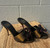 Luxurious satin uppers are elevated by a unique rotating mesh flower accent with delicate sparkle detailing inside. Sophisticated and one-of-a-kind, perfect for weddings, formal events, or any occasion that calls for a little extra elegance.