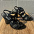 Multiple straps wrap up in classic gladiator style, finished with eye-catching studs and a sturdy stacked heel for extra height and edge. A versatile statement shoe that pairs perfectly with denim, dresses, or shorts for an effortlessly cool look.