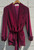 A long, flowing silhouette in luxurious velvet gives this vintage Saks Fifth Avenue jacket serious old-world elegance. A rare statement piece perfect for layering over eveningwear or adding a touch of timeless glamour to any outfit.