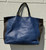 Sleek and sculptural, this tote showcases Furla's iconic Italian craftsmanship with clean lines and a structured silhouette. The convertible handle design offers effortless styling versatility, while the spacious interior keeps you organized for work, travel, or everyday essentials. A polished, timeless piece that elevates any outfit with understated Italian elegance.