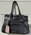 Rich pebbled leather gives this satchel a refined, textural finish that only gets better with wear, while Coach's signature hardware adds a polished touch. Structured yet roomy, it features sturdy top handles and a well-organized interior built for everyday essentials. A timeless piece that pairs effortlessly with any outfit, season after season.