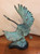 This is a Vintage Bronze Crane Sculpture “In Flight”. A beautiful art piece with an energetic feel of flight and freedom! Great collectible and display piece.  Measures 14" x 11".