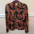 Vintage Red Floral Zipper Jacket
From the Palmer House Boutique!
Size: 10