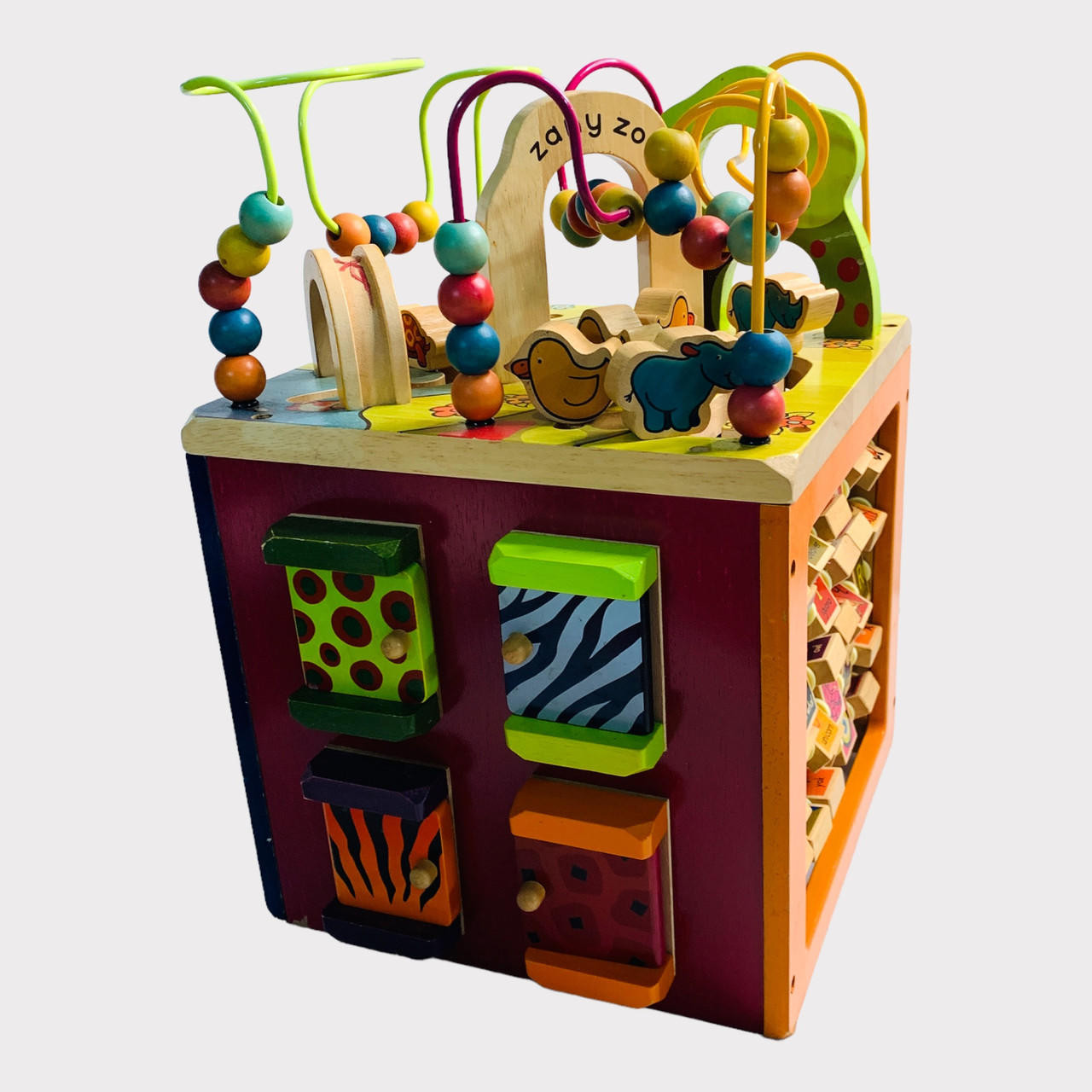 B. Toys, wooden activity cube Zany Zoo Thread