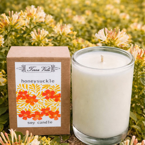 Honeysuckle Soy Candle. If you like the fragrance of honeysuckle, then you'll really love this candle. A sweet blend of honeysuckle with hints of jasmine, rose and lilac. Natural soy wax candle, hand poured in small batches. An artisan soy wax candle of the highest quality. Natural soy wax candle, hand poured in small batches. An artisan soy wax candle of the highest quality.