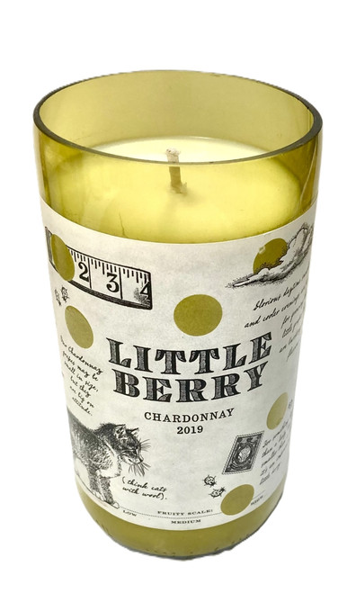 Up-cycled Wine Bottle Candle. Wax content is aprox 17 oz resulting in over 100 hours burn time.