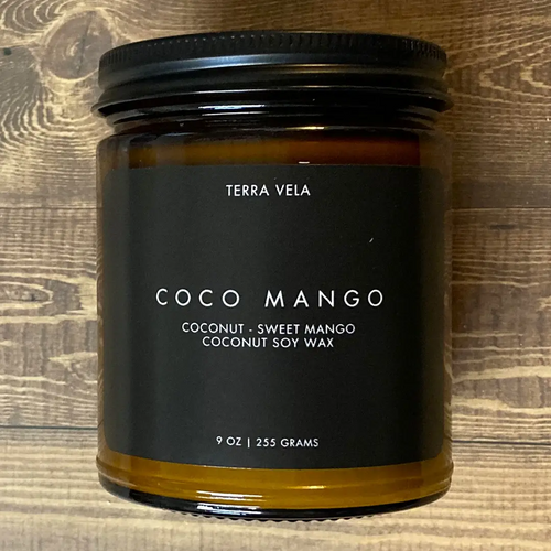 Terra Vela Amber Jar soy wax candle with black lid, burns for up to 50 hours.