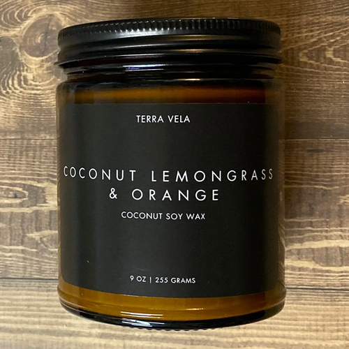 Terra Vela Amber Jar soy wax candle with black lid, burns for up to 50 hours.