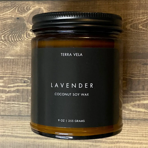 Terra Vela Amber Jar soy wax candle with black lid, burns for up to 50 hours.