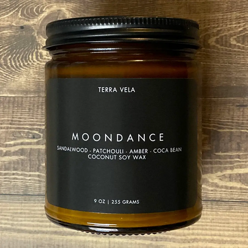 Terra Vela Amber Jar soy wax candle with black lid, burns for up to 50 hours.