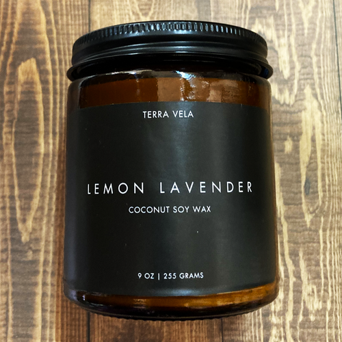 Terra Vela Amber Jar soy wax candle with black lid, burns for up to 50 hours.