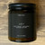 Terra Vela Amber Jar soy wax candle with black lid, burns for up to 50 hours.
