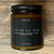 Terra Vela Amber Jar soy wax candle with black lid, burns for up to 50 hours.