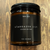 Terra Vela Amber Jar soy wax candle with black lid, burns for up to 50 hours.