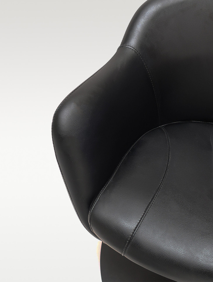 Close-up of Belava Grace pedicure chair cushioned seat and armrest