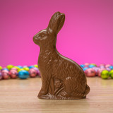 Solid milk chocolate sitting rabbit with flower #78