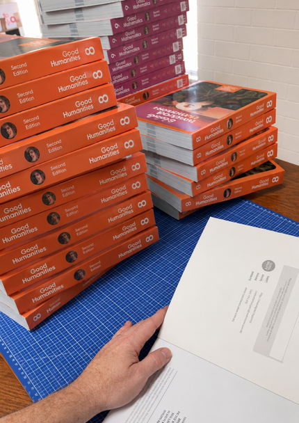 A book covering service offering professional covering for any quantity of books, large or small.