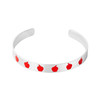 Stainless steel cuff bracelet with a red apple design, featuring the inscription 'I care, I teach' on the inside.