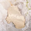 Baby in Cradle Gold Ornament 